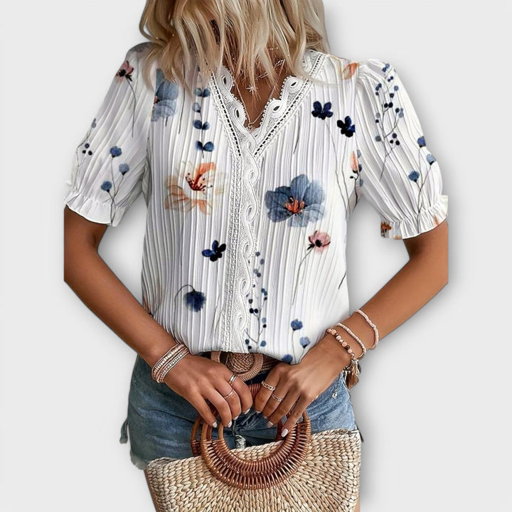 Emília - Blusa com decote em V